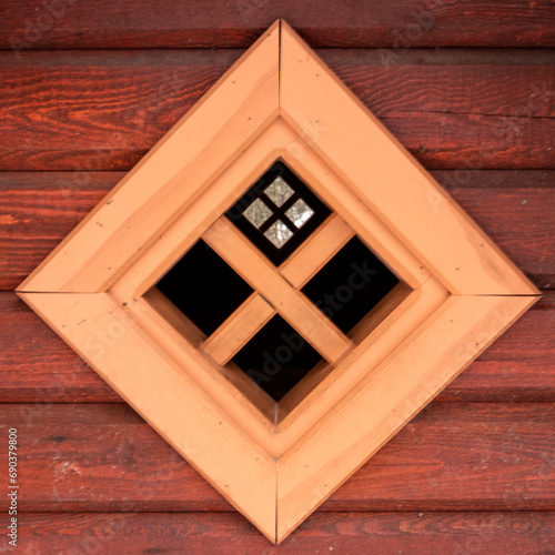 Rustic Charm: Salmon-Colored Window Frame in Tervetes Dabas Parks' Snowy Forest photo