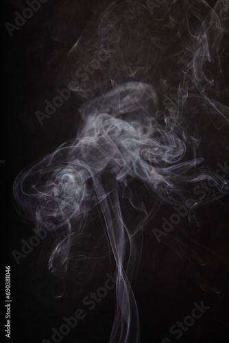 Ethereal Incense Smoke Flowing on Dark Background