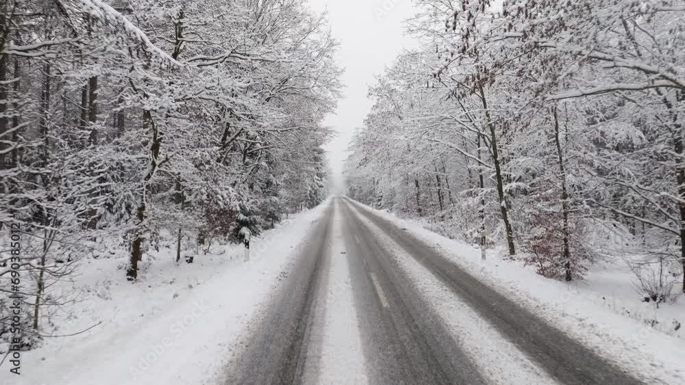 Aerial view of a snowy road in northern germany Aerial view of a snowy road in northern germany