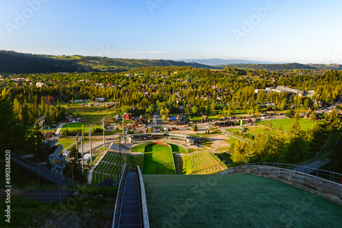 Wielka Krokiew, view from the top of the ski jump towards the stands and part of the city of Zakopane. photo