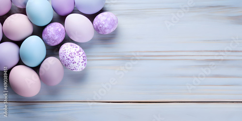 Color easter eggs on a wood background - Celebration design