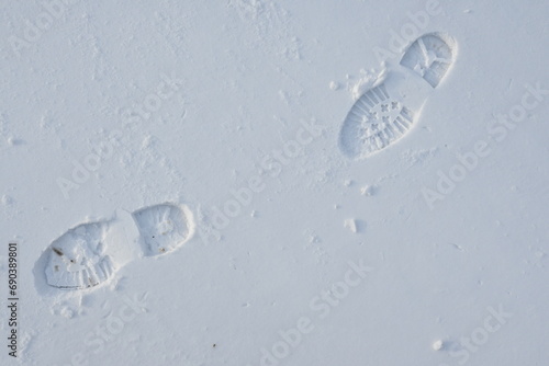 bootprints in the white snow photo