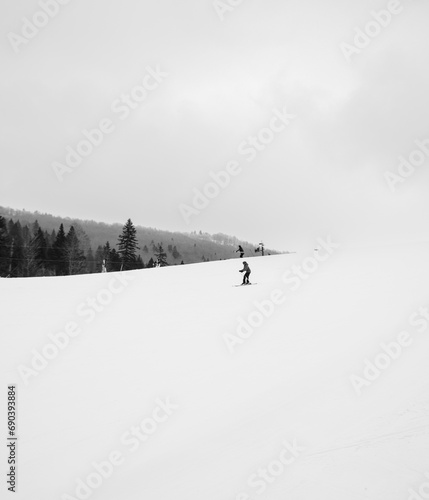 Skiing through the Kolašin mountain (ID: 690393884)