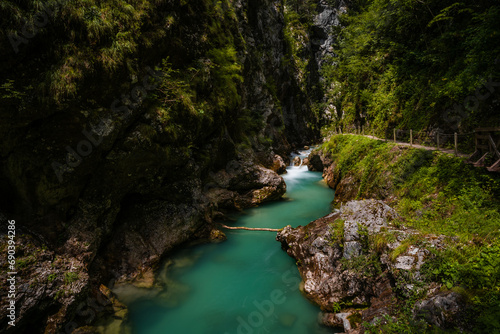 The incredible nature and beauty of pure wild river hidden deep in forest and rocks in national park Tolminska Korita in Slovenia.