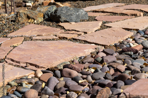 Flagstone and gravel backyard flooring landscape project