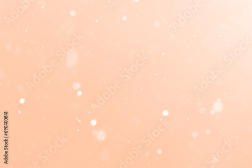 Delicate peach background. Color of the Year 2024 Peach fuzz.