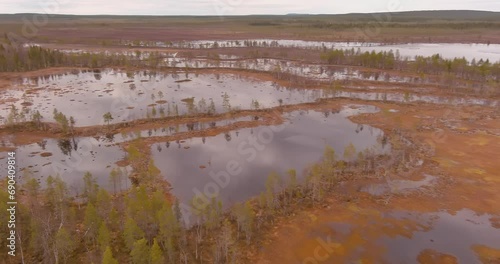 Aerial landscape view of Viiankiaapa bog in cloudy spring weather, Sodankylä, Lapland, Finland. photo