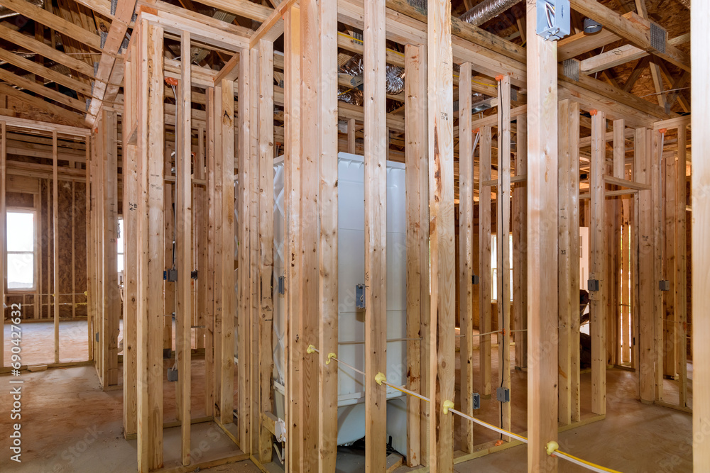 Sticking framework on new construction home wooden framing with beams Sticking framework on new construction home wooden framing with beams