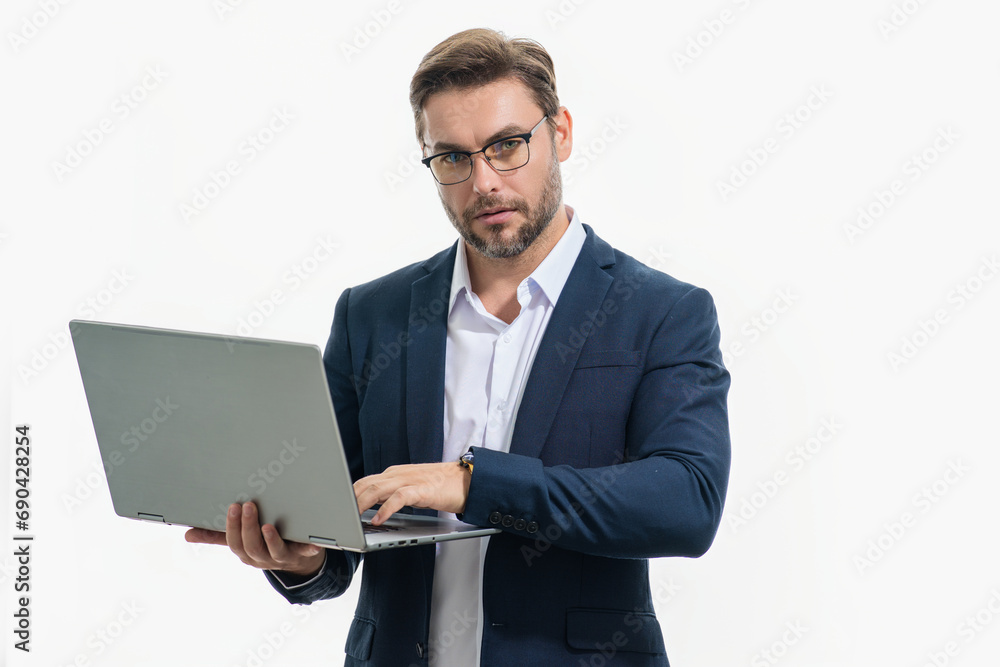 Freelancer man working on laptop in studio. Man freelancer checking laptop. Serious freelancer writing text on laptop. Male freelancer employee using laptop. Freelance and business. Freelancer man working on laptop in studio. Man freelancer checking laptop. Serious freelancer writing text on laptop. Male freelancer employee using laptop. Freelance and business.