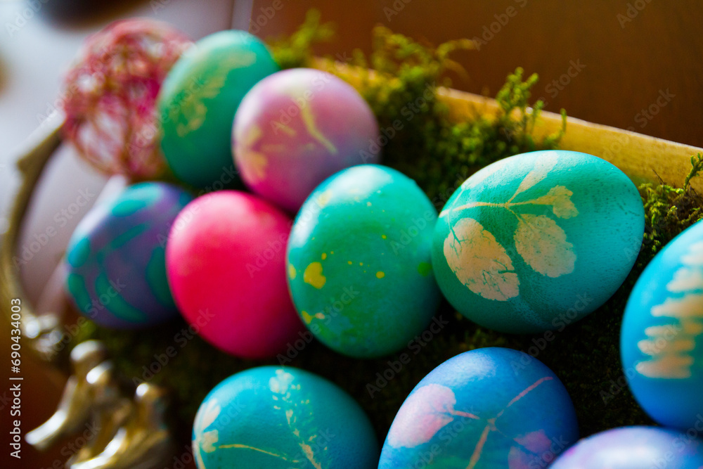 Colorful Easter Eggs in Moss with Botanical Prints Close-Up Colorful Easter Eggs in Moss with Botanical Prints Close-Up