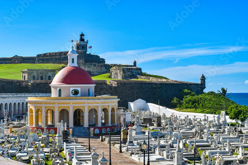 Historic, oceanfront Santa Maria Magdalena de Pazzis Cemetery or Old San Juan Cemetery with Castillo San Felipe del Morro on the island of Puerto Rico, United States. photo