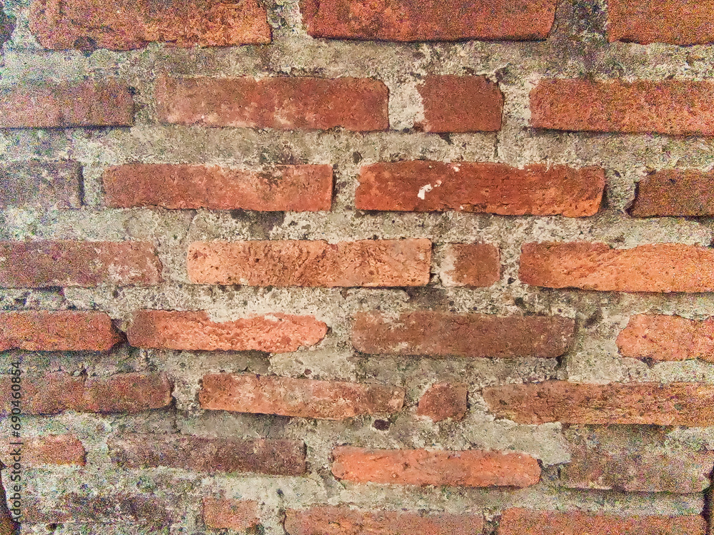 Fototapeta premium The red brick walls are brittle with age