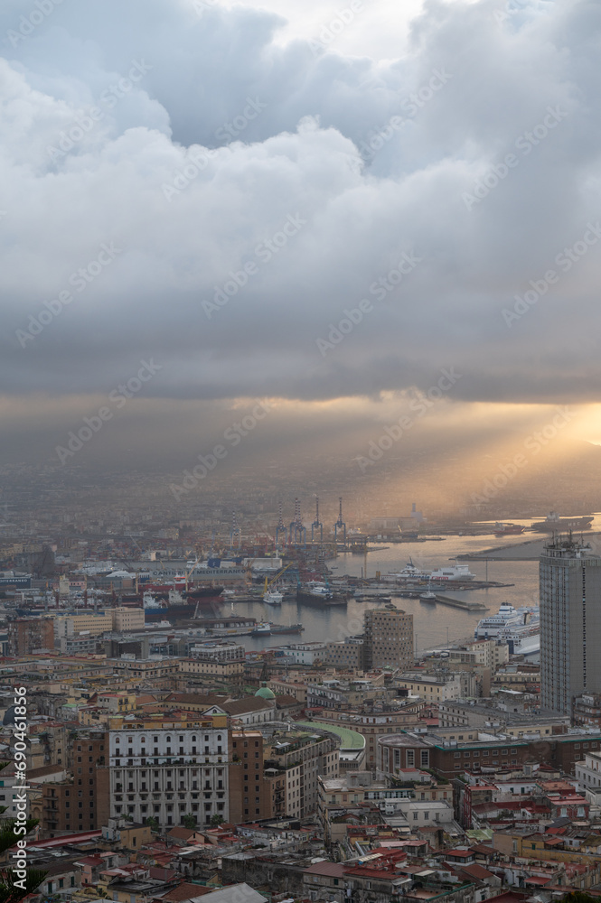 Panorama of the sea port of the city of Napoli in the morning with Vesuvius in the background