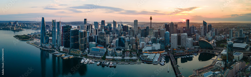 Fototapeta premium Panoramic aerial drone view of Barangaroo waterfront precinct in Sydney City, NSW Australia during a morning sunrise in December 2023 
