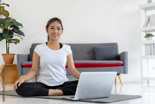 Free Download Online Yoga Tutorial: Young Woman Practices Yoga at Home - GFXLoad