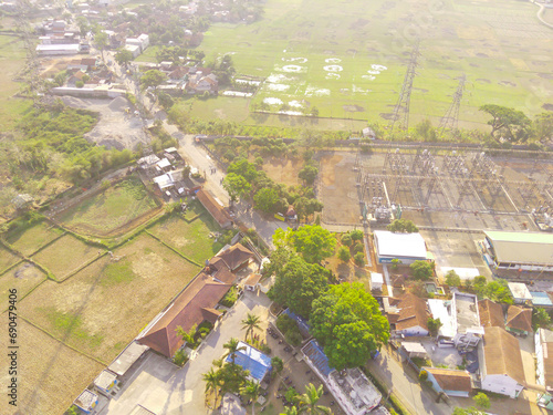 Landscape Photography. Aerial Landscapes. Bird eye view of the Countryside on a dewy morning. Cityscape in the Bandung area - Indonesia. Aerial Shot from a flying drone.