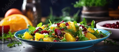 Fototapeta Naklejka Na Ścianę i Meble -  Orange and beet salad with rocket