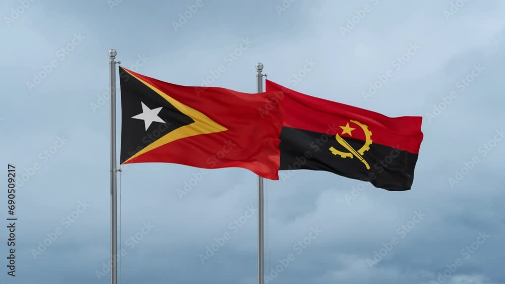 Timor flag and Angola flag waving together on cloudy sky, endless seamless loop Timor flag and Angola flag waving together on cloudy sky, endless seamless loop