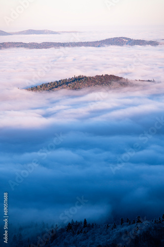 Fototapeta Naklejka Na Ścianę i Meble -  Beautiful winter mountain landscape. Moody sunset seen from the Mount Smerek in the Bieszczady National Park, Poland.