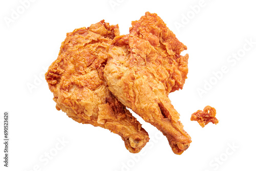 2 large chicken thighs batter and deep fried isolated on white background. fried chicken is a dish consisting of chicken pieces that have been coated with seasoned flour or batter.