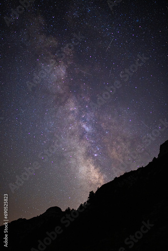 Night sky with stars. Milky Way galaxy and captured meteors. 