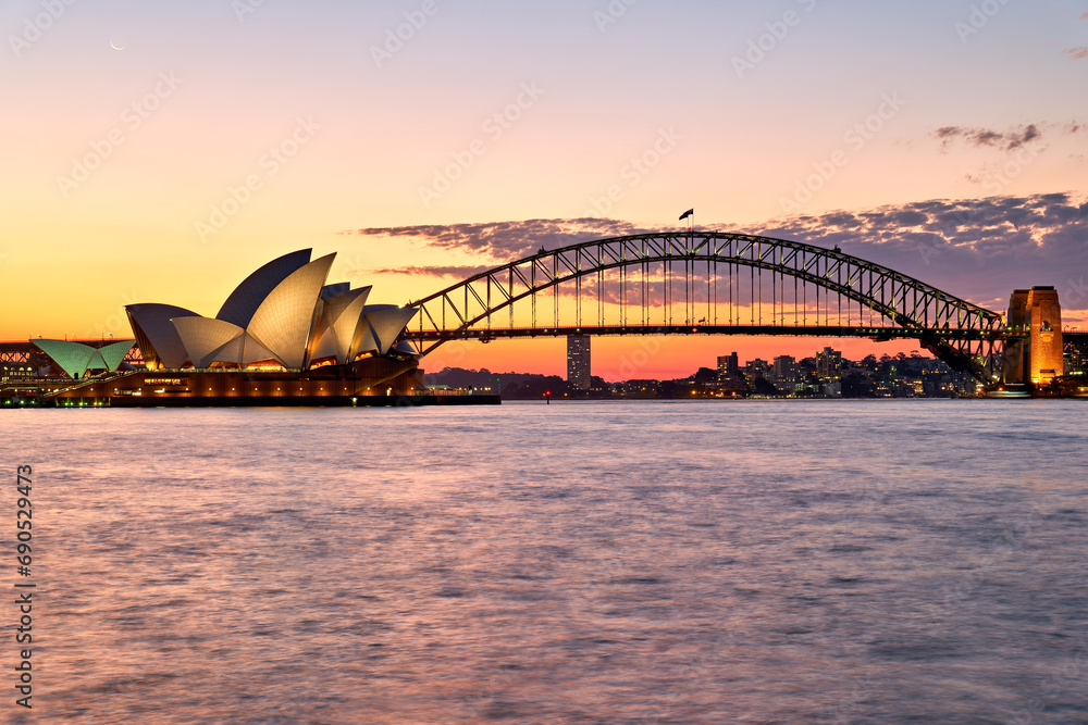 Fototapeta premium Sydney. New South Wales. Australia. The Opera House at sunset and the harbour bridge