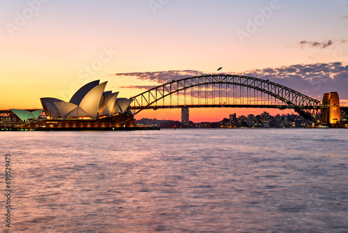 Fototapeta Naklejka Na Ścianę i Meble -  Sydney. New South Wales. Australia. The Opera House at sunset and the harbour bridge