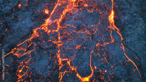 Aerial view over volcanic eruption, Night view, lava spill out of the crater ( Iceland)