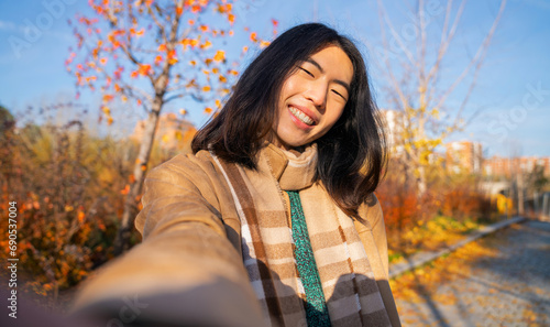 selfie gay asian boy lgbt smiling at camera in autumn season