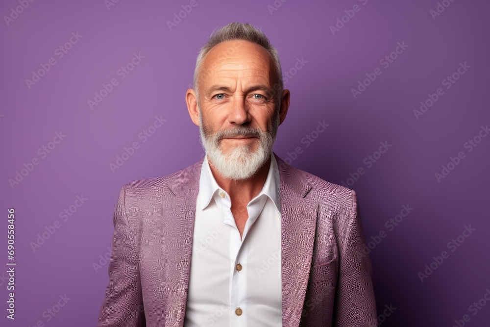 Portrait of an old man with a beard. Isolated over purple background. Portrait of an old man with a beard. Isolated over purple background.