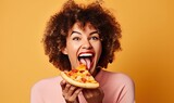 A Joyful Woman Enjoying a Delicious Slice of Pizza with Her Wide Smile