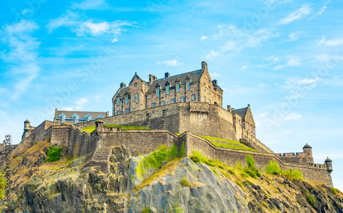Edinburgh Castle over blue sky, Scotland photo