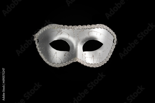 Carnival mask, an elegant masquerade accessory for a cabaret show, black background