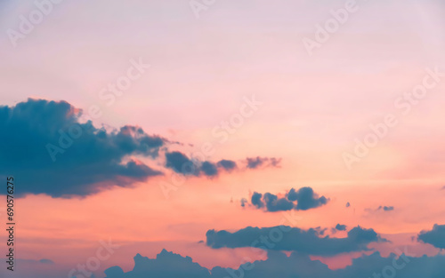 Pastel Sunset Sky  Cotton Candy Clouds  and Peach Horizon Abstract Background with Grain Noise. Gradient Evoking Tranquil Sunsets and Dreamy Landscapes. Textured and Vibrant for Creative Designs.