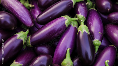 Healthy, natural and eggplant background in studio for farming, organic produce and lifestyle. Fresh, summer food and health meal closeup for eco farm market, fibre diet and vegetable agriculture photo