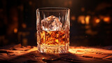 Crystal glass of whiskey with ice cubes on black background. Glass of scotch whiskey and ice on bokeh background. Whiskey with ice on a wooden table.