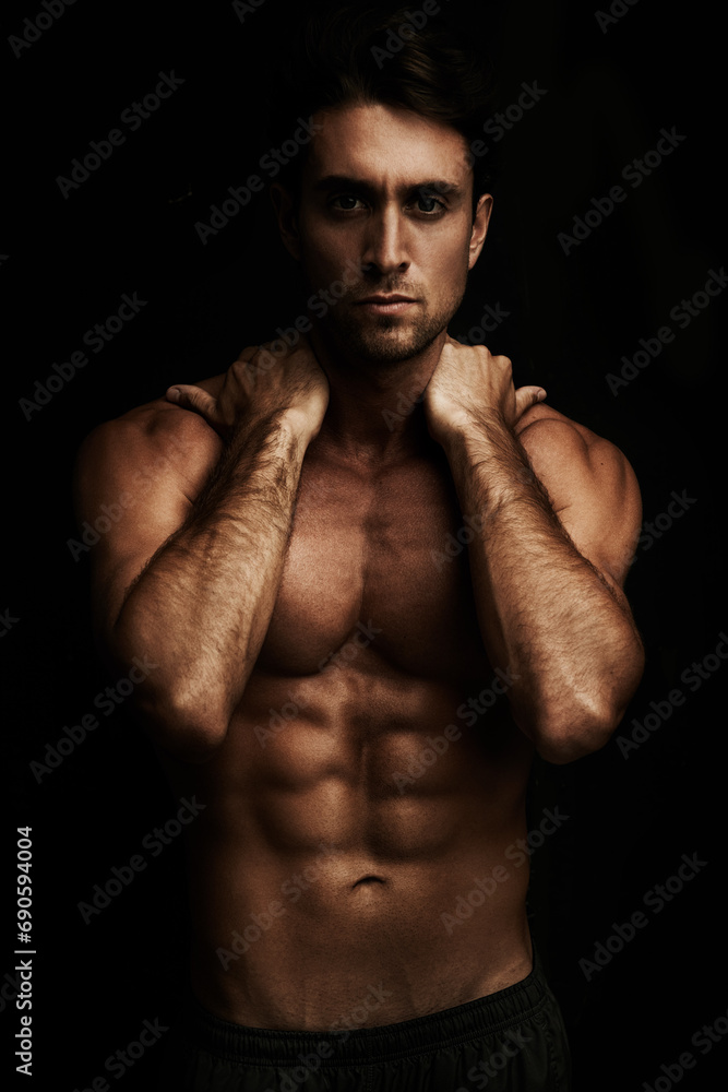 Six pack, black background or portrait of man for workout, training or exercise in studio for fitness. Model, dark shadow or ripped male person with healthy body, abs or stomach for wellness in Italy