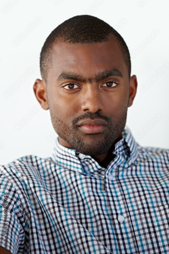 Obraz premium Serious, white background and portrait of business black man for working, career and office job. Corporate manager, startup company and face of worker with confidence, pride and ambition mindset