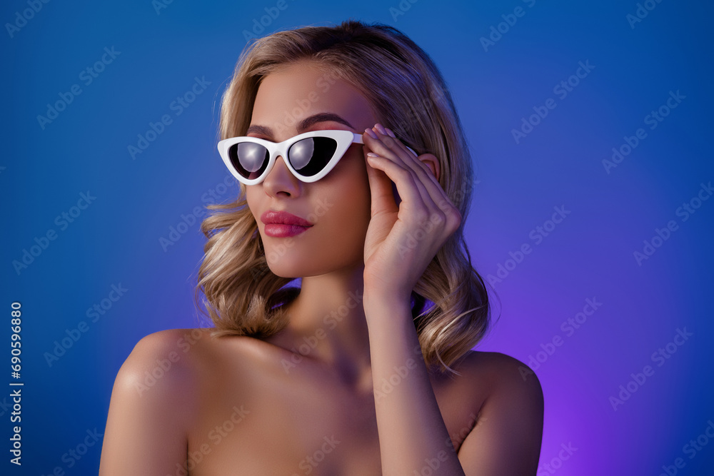 Photo of cool fancy lady enjoy luxurious summer spa resort sun tan procedure over blue background Photo of cool fancy lady enjoy luxurious summer spa resort sun tan procedure over blue background