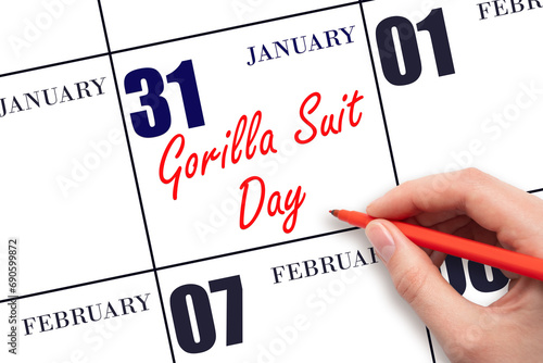 January 31. Hand writing text Gorilla Suit Day on calendar date. Save the date. photo