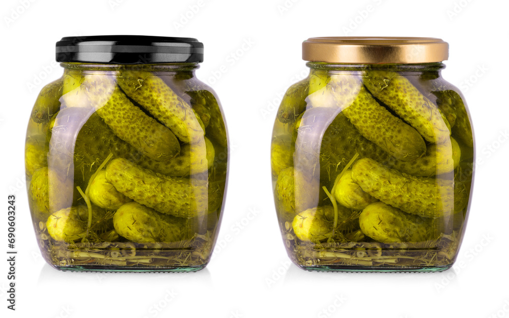Set of Pickled cucumbers in glass jars on a white background with clipping path