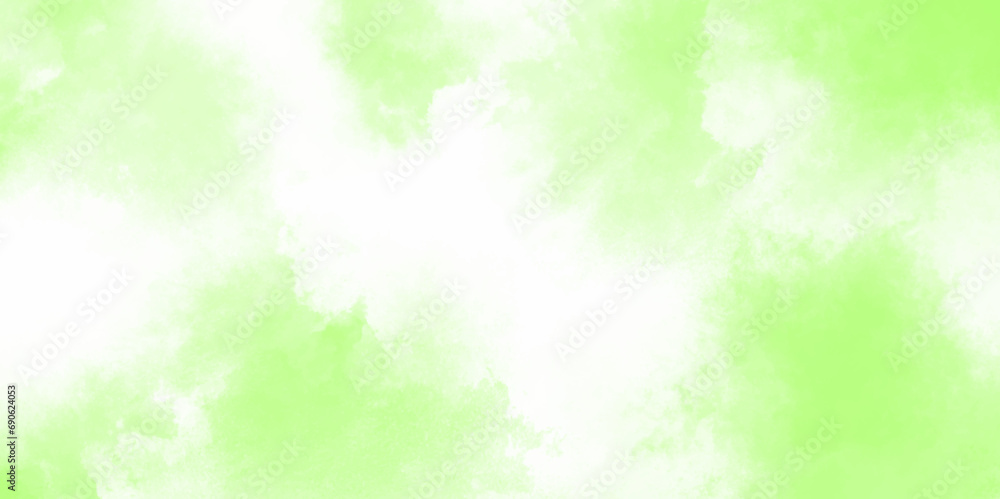 Green watercolor background. Creative green and yellow shades hand drawn texture. Soft blurred fog or haze in sunlight sky Beautiful abstraction of liquid paints in slow blending flow mixing