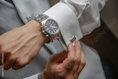 hand, watch, business, time, clock, businessman, suit, wristwatch, hands, wrist, arm, wedding, people, woman, shirt, person, men, finger, groom, clothing, checking, work, office, fashion