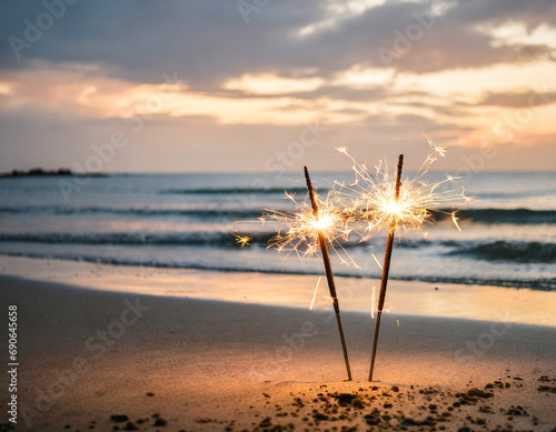 Sparklers at the beach for New Year or party with copy space