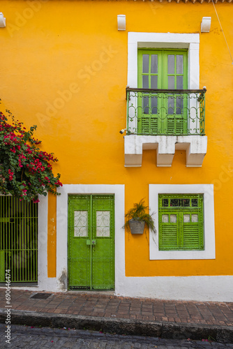 Facades with colorful houses fill the urban scene with traditional architecture in the historic center of Olinda, Pernambuco, Brazil.