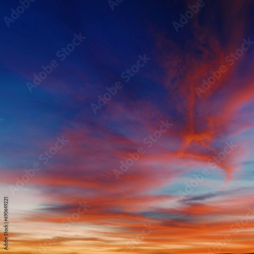 Sunset with clouds being painted in bright red color (square)