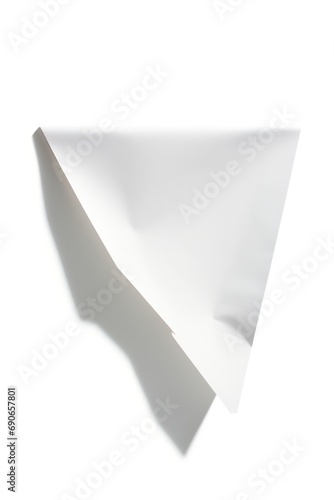 A piece of folded paper with a shadow isolated on white background 