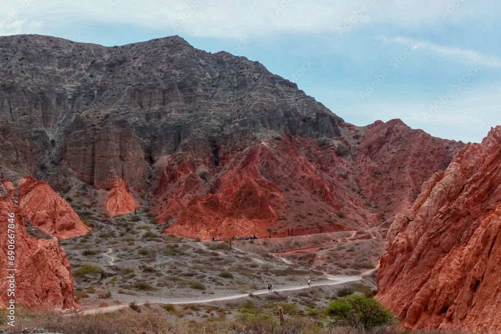 Hill of seven colors, Purmamarca, Argentina, mountain range with colorful purple and orange colors.