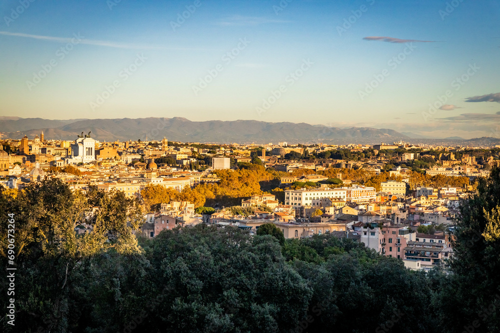 Gorgeous aerial view of the city center in Rome at sunny sunset