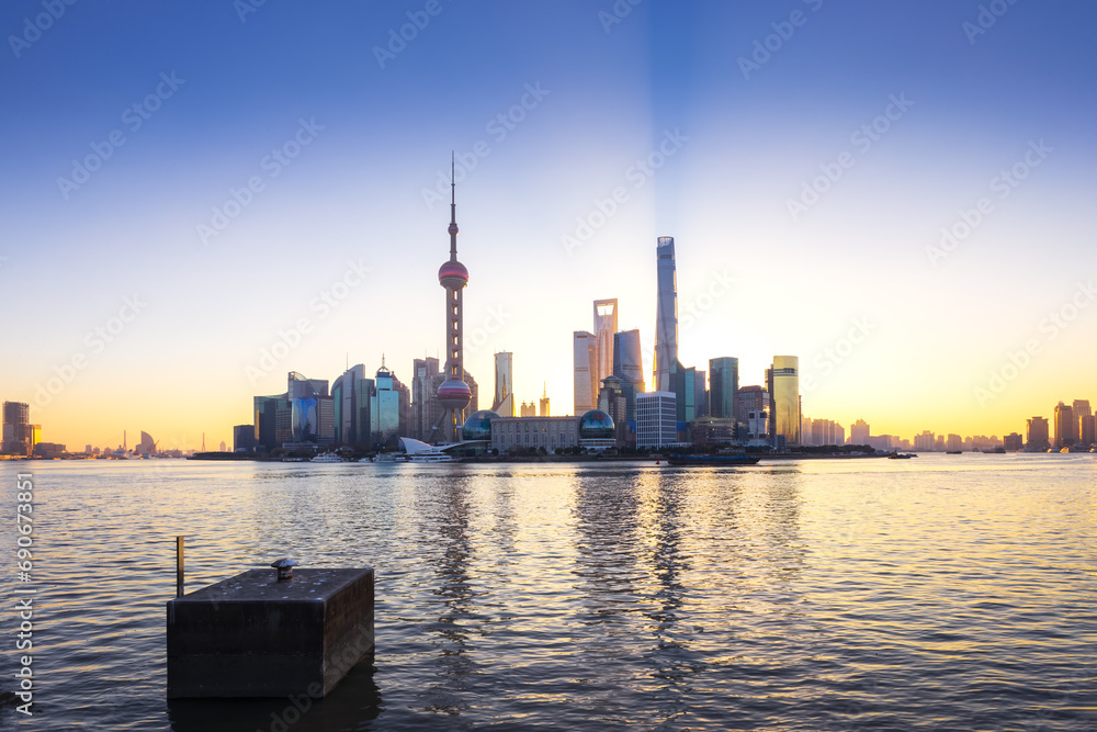 Shanghai skyline and cityscape at sunrise.